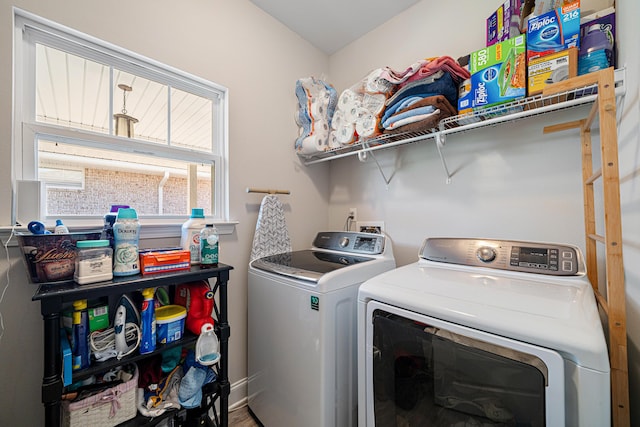 laundry area featuring laundry area and washing machine and dryer
