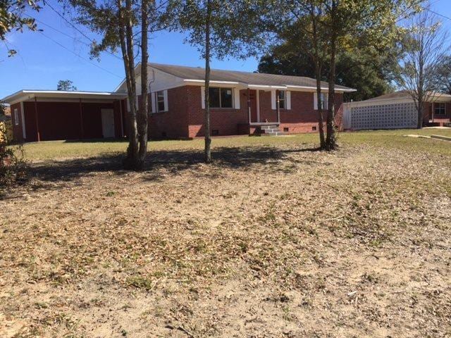 306 N 58th Ave, Pensacola, FL 32506 - view of front of home with a front lawn
