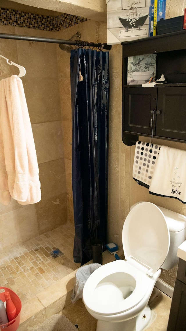 306 N 58th Ave, Pensacola, FL 32506 - bathroom featuring a shower stall, vanity, and toilet
