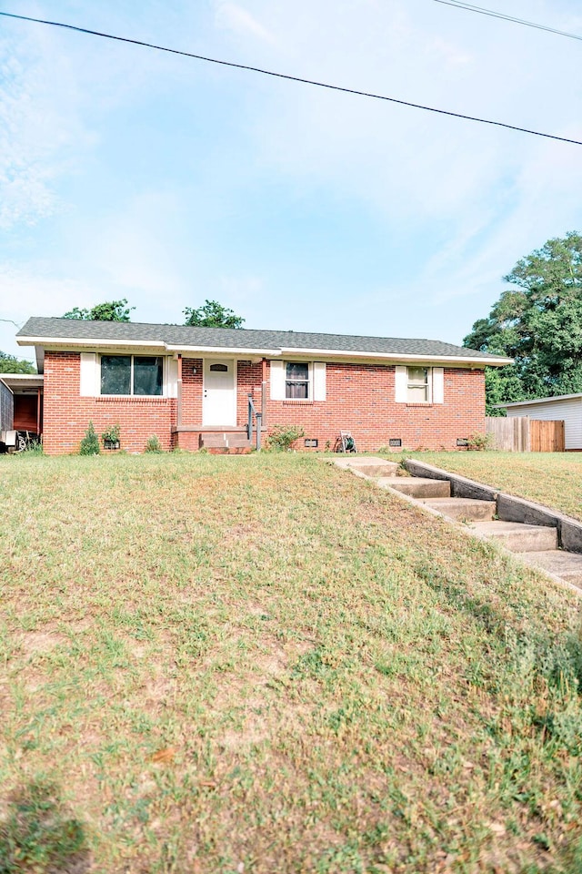 306 N 58th Ave, Pensacola, FL 32506 - ranch-style home featuring a front lawn and brick siding