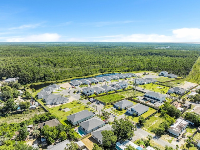 213 N Wells St, Panama City Beach, FL 32413 - birds eye view of property with a residential view and a wooded view