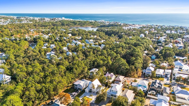 aerial view featuring a residential view and a water view