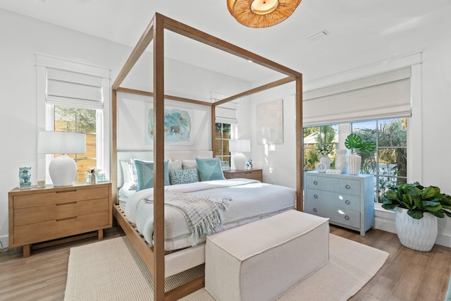 bedroom featuring light wood-type flooring