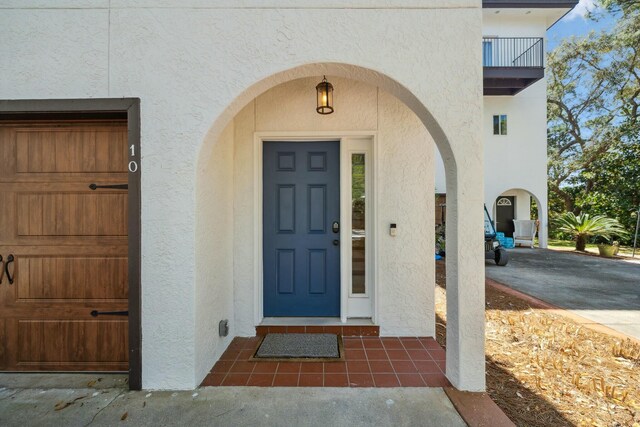 10 Mar A Lago Blvd # 14, Santa Rosa Beach, FL 32459 - doorway to property featuring stucco siding