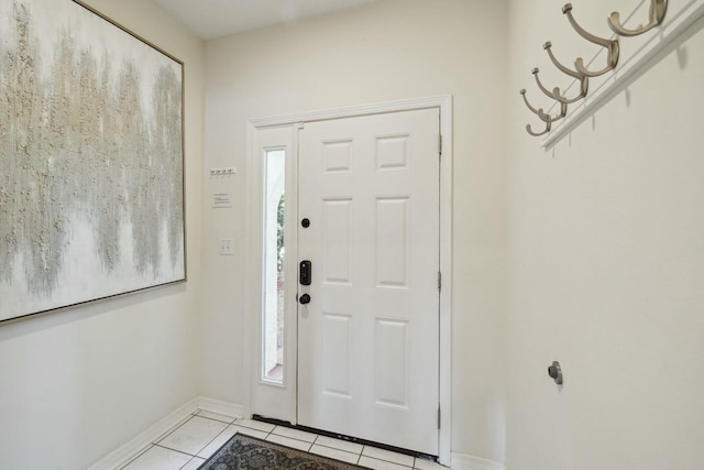 10 Mar A Lago Blvd # 14, Santa Rosa Beach, FL 32459 - foyer with light tile patterned floors, baseboards, and a wealth of natural light