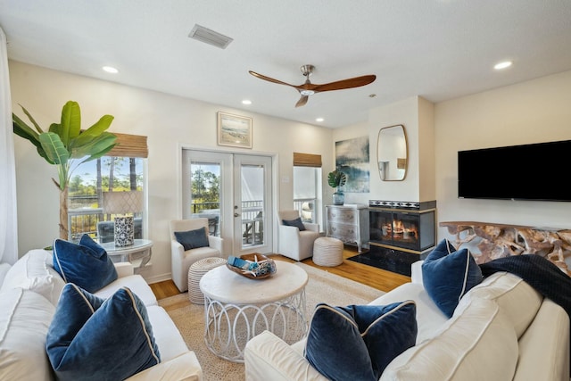 10 Mar A Lago Blvd # 14, Santa Rosa Beach, FL 32459 - living room with french doors, a ceiling fan, visible vents, wood finished floors, and recessed lighting