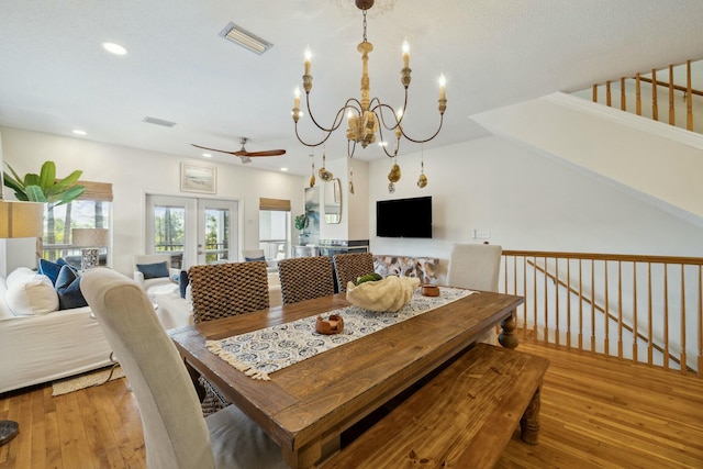 10 Mar A Lago Blvd # 14, Santa Rosa Beach, FL 32459 - dining area with visible vents, stairway, recessed lighting, hardwood / wood-style flooring, and ceiling fan with notable chandelier