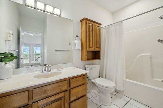 10 Mar A Lago Blvd # 14, Santa Rosa Beach, FL 32459 - full bathroom with vanity, shower / tub combo, tile patterned floors, and toilet