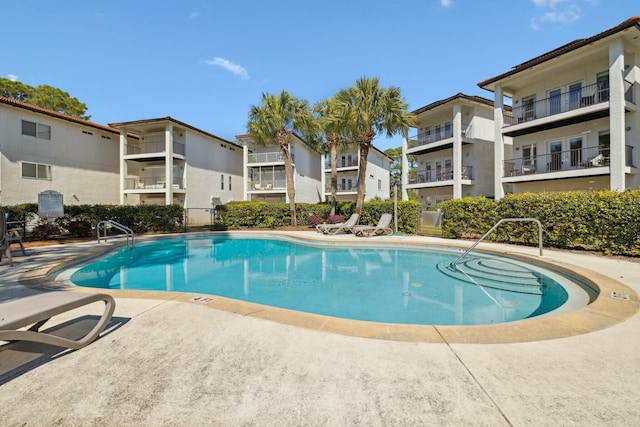 10 Mar A Lago Blvd # 14, Santa Rosa Beach, FL 32459 - pool with a patio and a residential view
