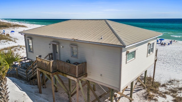 17 Fort Panic Rd, Santa Rosa Beach, FL 32459 - back of house featuring a water view, a view of the beach, and metal roof