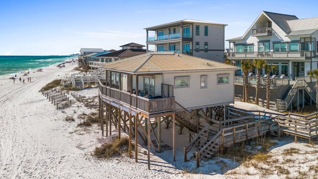 17 Fort Panic Rd, Santa Rosa Beach, FL 32459 - back of house featuring stairway, a water view, a view of the beach, and metal roof