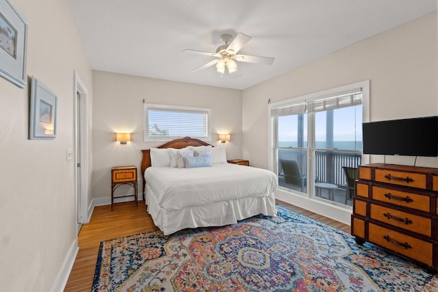 17 Fort Panic Rd, Santa Rosa Beach, FL 32459 - bedroom featuring baseboards, light wood-style floors, and ceiling fan