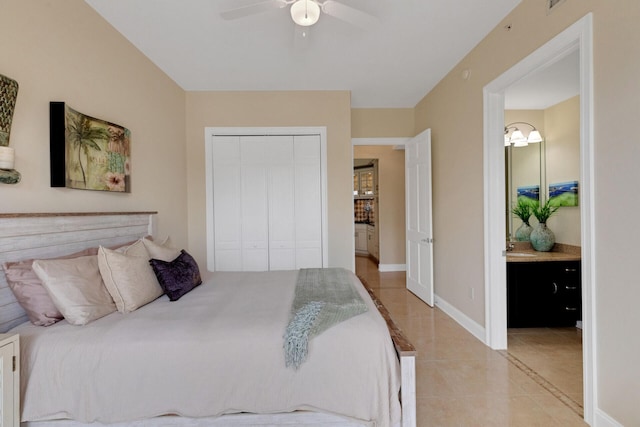 5 Calhoun Ave Unit 208, Destin, FL 32541 - bedroom featuring light tile patterned floors, a closet, a ceiling fan, and baseboards
