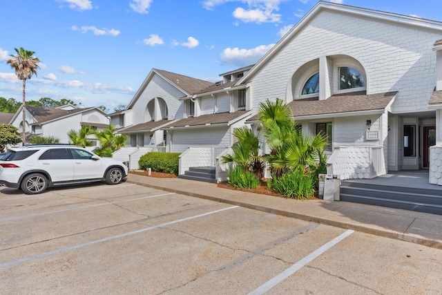 8980 Heron Walk Dr # 8980, Miramar Beach, FL 32550 - view of front of property with a residential view and uncovered parking