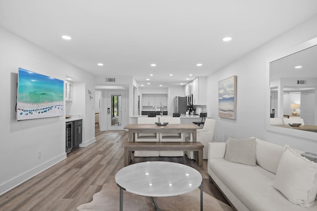 8980 Heron Walk Dr # 8980, Miramar Beach, FL 32550 - living area featuring recessed lighting, light wood-type flooring, visible vents, and beverage cooler