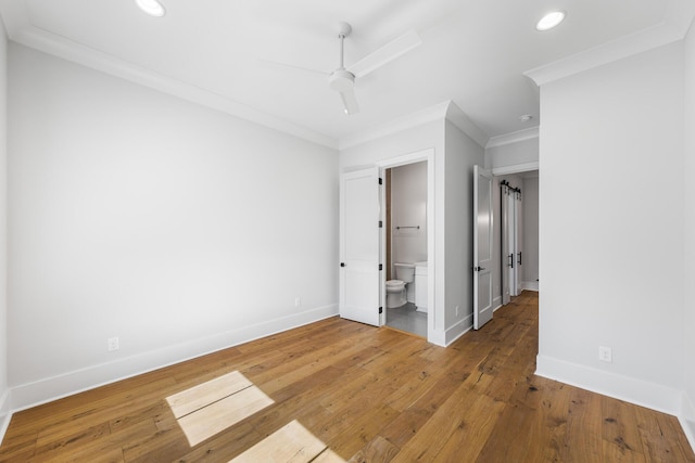 unfurnished bedroom featuring ornamental molding, baseboards, light wood-type flooring, and recessed lighting