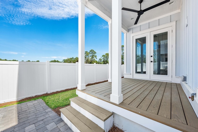 exterior space featuring a patio area, french doors, fence, and a ceiling fan