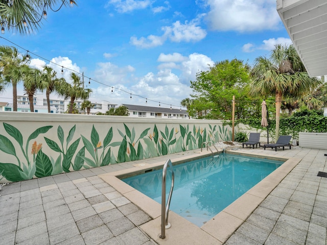 pool with a patio