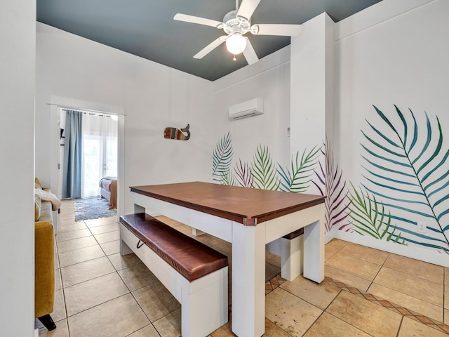 dining area with a wall mounted air conditioner, a ceiling fan, and light tile patterned floors