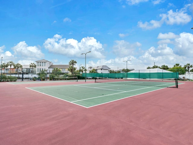 view of sport court with community basketball court and fence