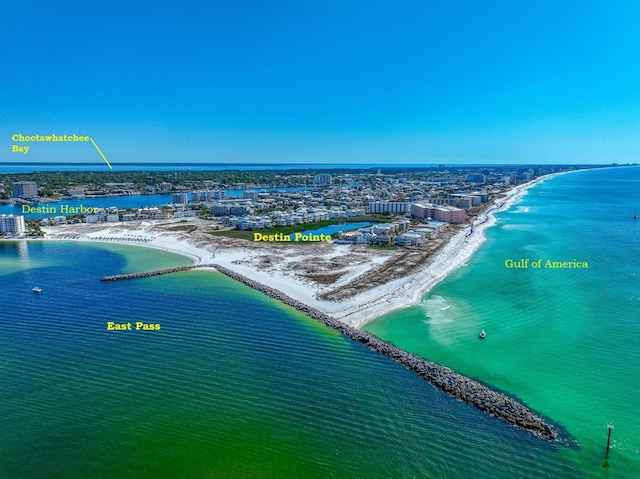 birds eye view of property featuring a view of the beach and a water view