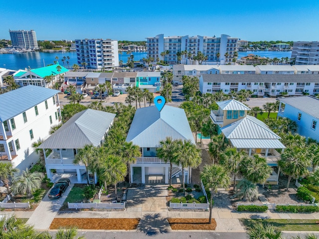 birds eye view of property featuring a water view