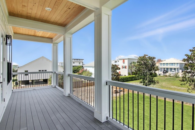 162 Casting Lake Rd, Miramar Beach, FL 32550 - wooden deck featuring a lawn and a residential view