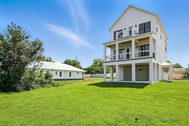 162 Casting Lake Rd, Miramar Beach, FL 32550 - rear view of property with a balcony, a yard, and a patio area