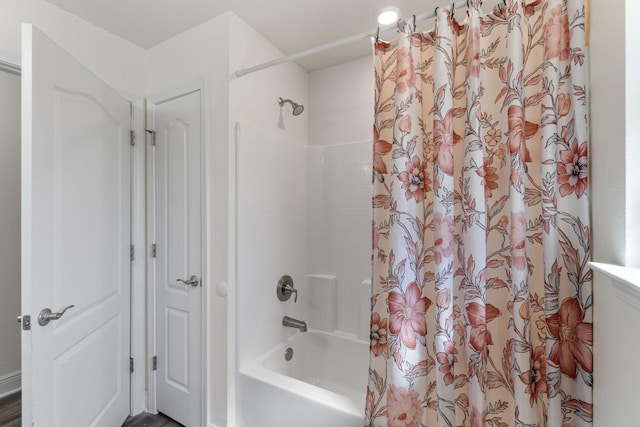 full bath with shower / bath combination with curtain