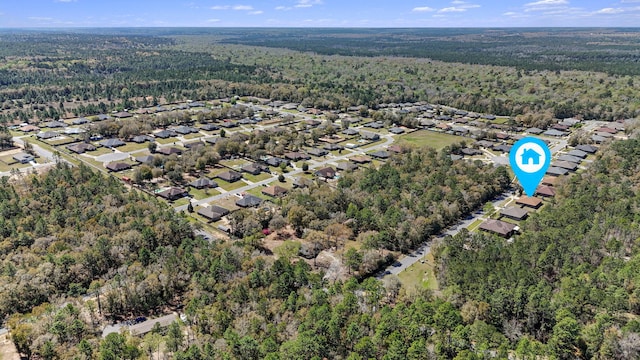 bird's eye view with a residential view and a forest view