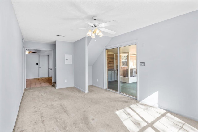 unfurnished bedroom with visible vents, ceiling fan, and carpet