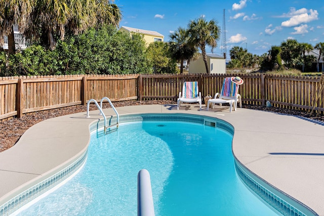 617 E E Gorrie Dr, Saint George Island, FL 32328 - view of pool featuring a fenced backyard, a patio area, and a fenced in pool