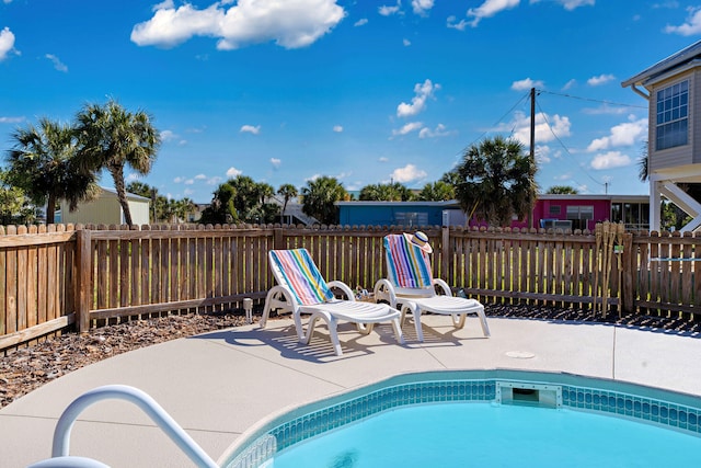 617 E E Gorrie Dr, Saint George Island, FL 32328 - view of pool with a fenced backyard and a patio