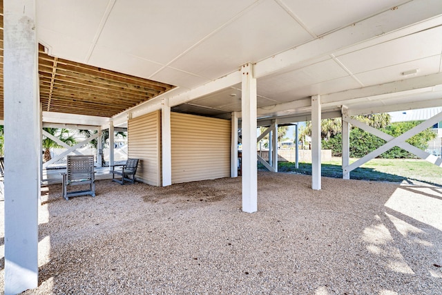 617 E E Gorrie Dr, Saint George Island, FL 32328 - view of patio with an attached carport and stairs
