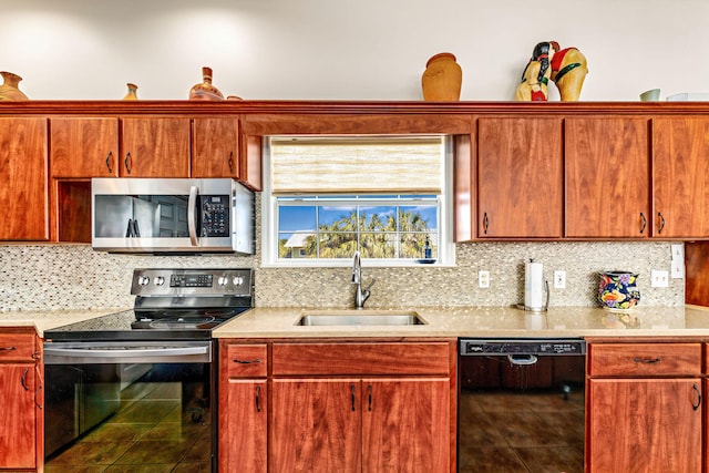 617 E E Gorrie Dr, Saint George Island, FL 32328 - kitchen with decorative backsplash, light countertops, stainless steel appliances, a sink, and tile patterned flooring