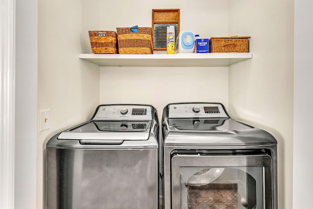 617 E E Gorrie Dr, Saint George Island, FL 32328 - washroom with independent washer and dryer and laundry area