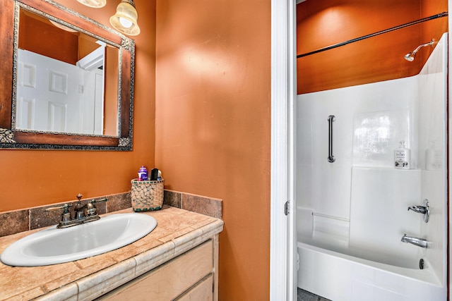 617 E E Gorrie Dr, Saint George Island, FL 32328 - bathroom featuring shower / tub combination and vanity