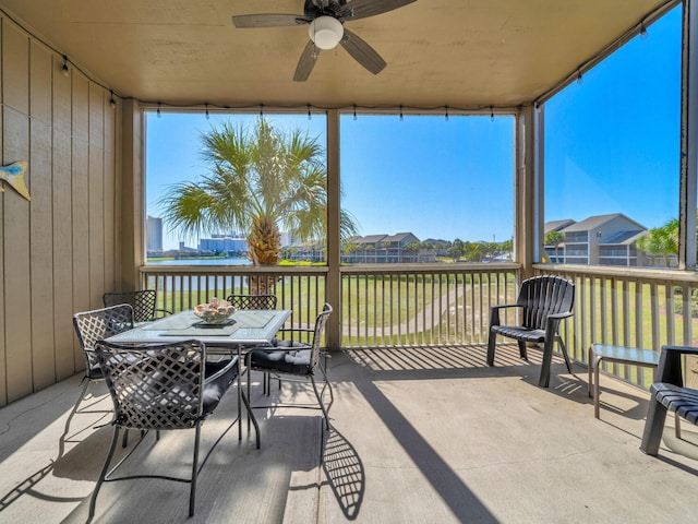 825 Seascape Dr Unit 407, Miramar Beach, FL 32550 - view of patio / terrace featuring ceiling fan, outdoor dining area, and a water view