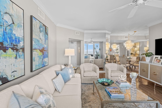 1 Beach Club Dr Unit 1205, Miramar Beach, FL 32550 - living room featuring a ceiling fan, wood finished floors, crown molding, and a chandelier