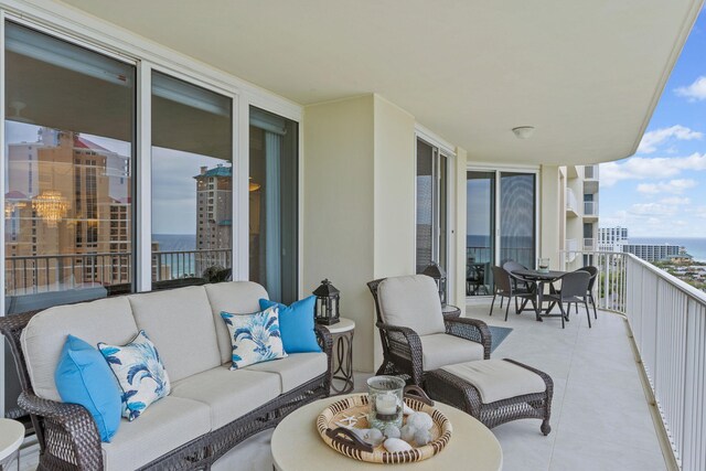 1 Beach Club Dr Unit 1205, Miramar Beach, FL 32550 - balcony featuring an outdoor living space and a water view