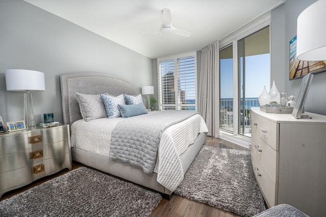 1 Beach Club Dr Unit 1205, Miramar Beach, FL 32550 - bedroom with access to outside, wood finished floors, and ceiling fan