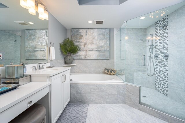 1 Beach Club Dr Unit 1205, Miramar Beach, FL 32550 - bathroom with a stall shower, a bath, vanity, marble finish floors, and recessed lighting