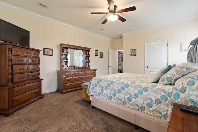 bedroom with dark colored carpet, visible vents, crown molding, and ceiling fan