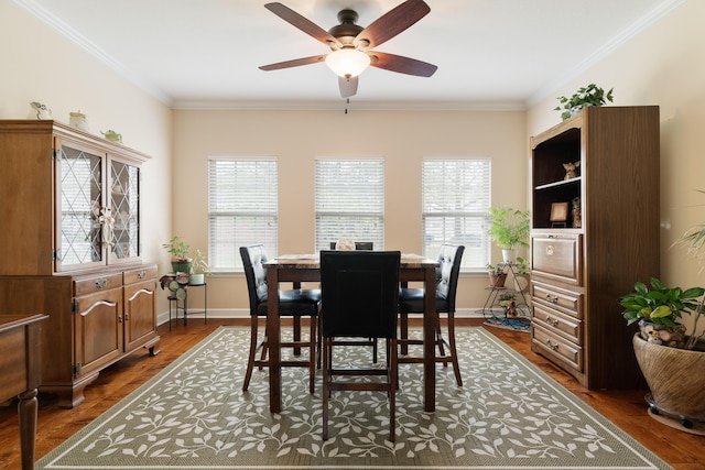 dining area featuring a ceiling fan, dark wood-style floors, and ornamental molding