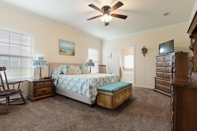 bedroom with crown molding, carpet, baseboards, ensuite bath, and visible vents