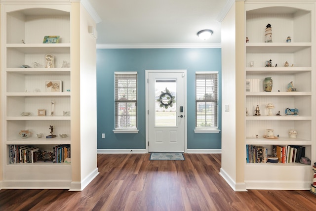 entrance foyer featuring baseboards, crown molding, and dark wood-type flooring