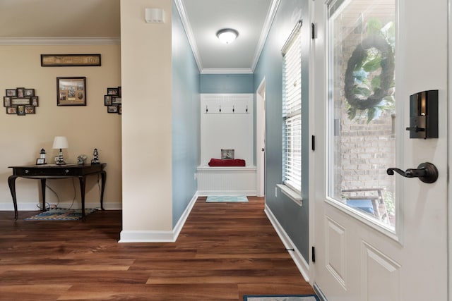 doorway with baseboards, dark wood-style flooring, and crown molding