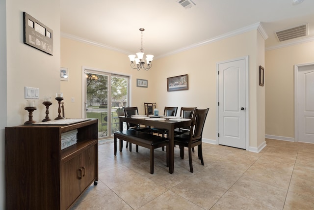 dining area featuring visible vents, crown molding, and a notable chandelier