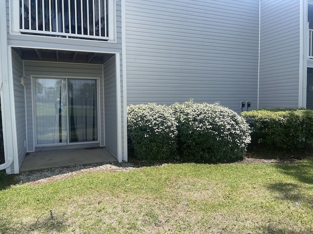 101 Old Ferry Rd Unit 5A, Shalimar, FL 32579 - view of yard with a balcony