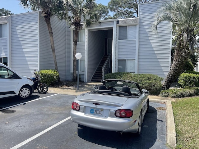 101 Old Ferry Rd Unit 5A, Shalimar, FL 32579 - view of building exterior with uncovered parking